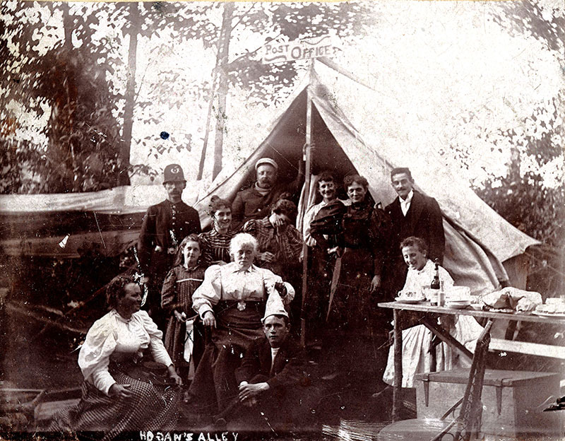 Hogan’s Alley, 1897 – English Bay Campsite and Early Black Community The name Hogan's Alley comes from an extremely popular newspaper comic strip from 1890s New York. In Vancouver, it inspired the nickname for this summer campsite at English Bay as well as the alley between Union and Prior Streets, where a black community formed. City of Vancouver Archives # Be P70.1.