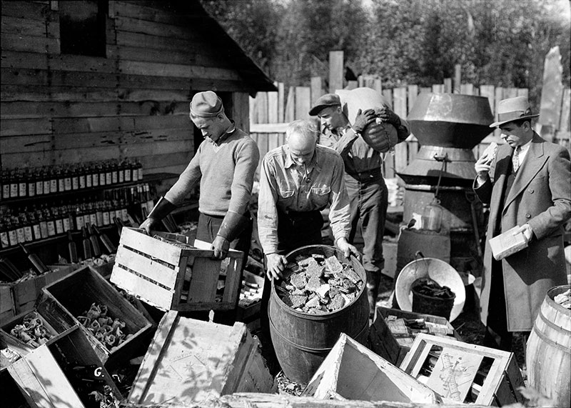 A Boozy History of Prohibition in Vancouver 23 RCMP seizure of a still on the Musqueam Reserve, 1932. Photo by Stuart Thomson, City of Vancouver Archives #99-4266.