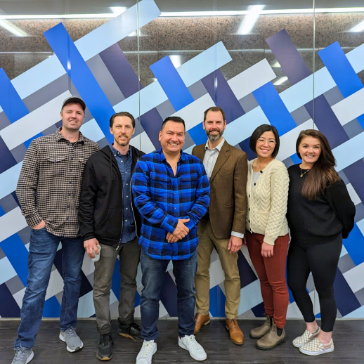 Chief Ian Campbell poses with the owners from Forbidden Vancouver Walking Tours, Cycle City Tours, Vancouver Foodie Tours, and Vancouver Water Adventures