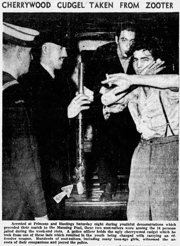 Vancouver's Zoot Suit Riots 8 Police confiscating a cherry wood cudgel from a East End zoot suiter. (Sun, August 7, 1944).